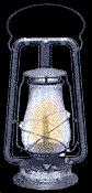 animated gif of a moth flying near an illuminated oil lamp